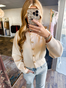 Hattie- Cream cropped cardigan featuring gold accent button front closure