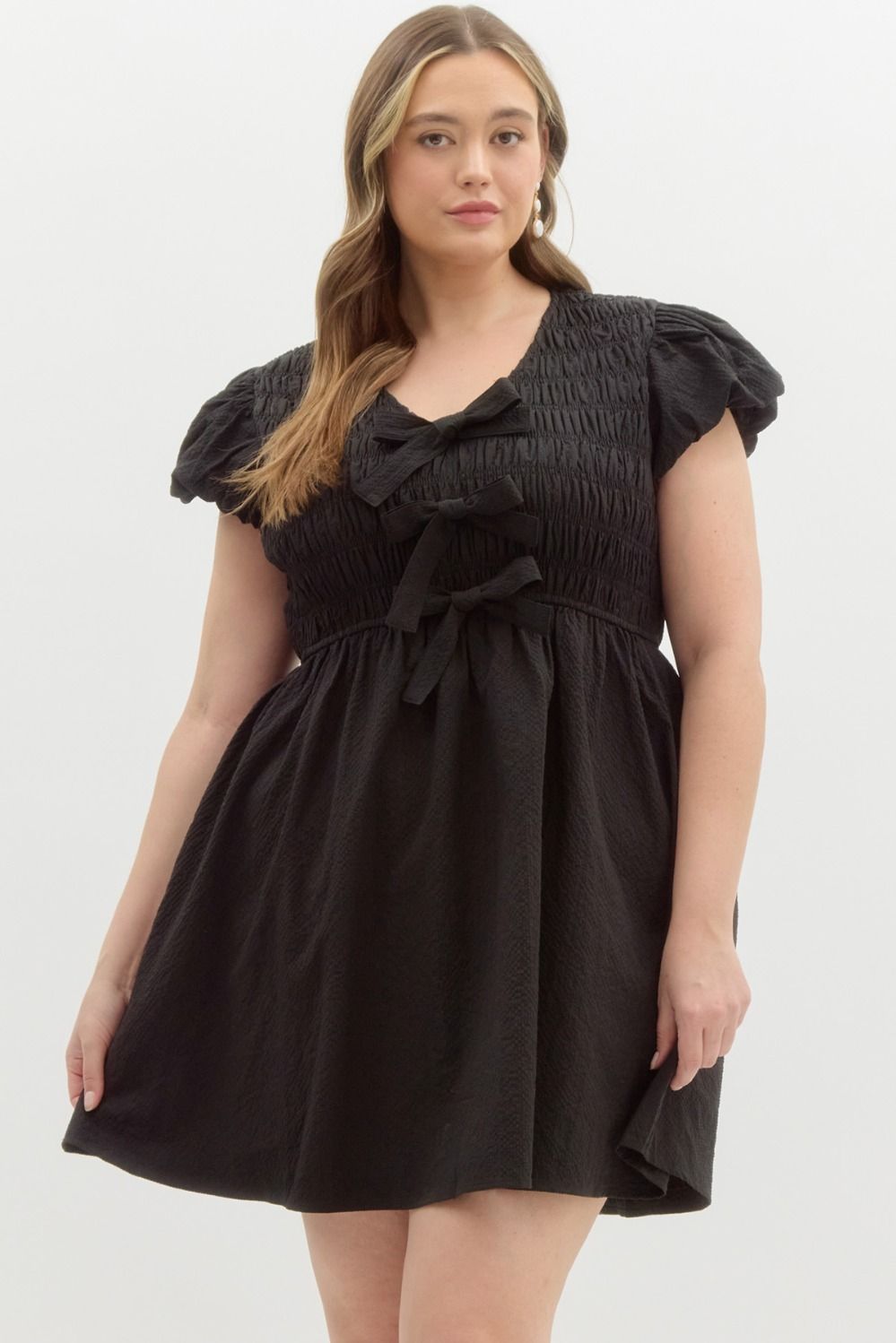 PLUS ZAIRA- Solid black textured bubble sleeve fit and flare dress with bow details