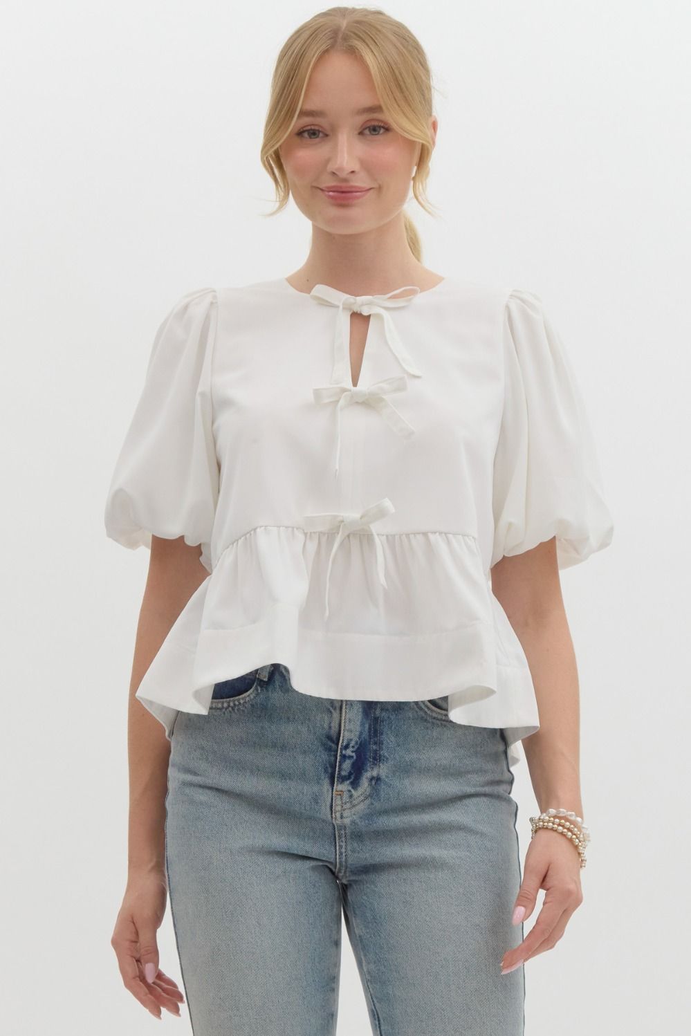 MYLIE- Off white Solid puff sleeve peplum  self bow tie  top