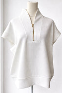 Ribbed white half zip high neck top