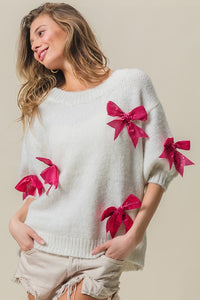 LAURA - Sequin Bow Trum short sleeve puff shoulder sweater top